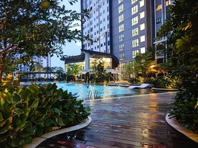 a swimming pool in the middle of a building at M Centura Sentul 2 bedrooms with pool in Kuala Lumpur