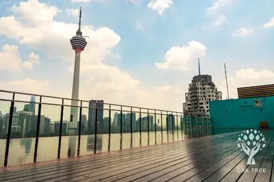 a boardwalk with a view of the berlin tv tower at Red M101 by Oak Tree in Kuala Lumpur