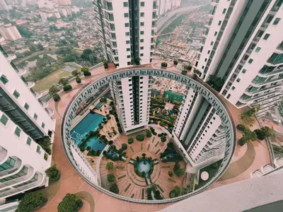 an aerial view of a large building with a garden at Datum Jelatek, Sky Ring in Kuala Lumpur