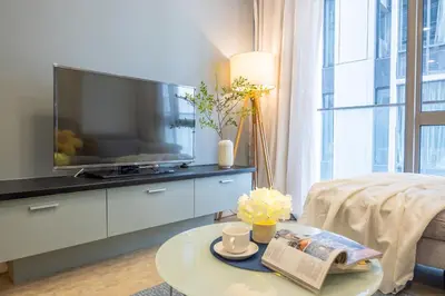 a living room with a tv and a coffee table at Bintang Fairlane Residences near Pavilion by GL Staycation in Kuala Lumpur