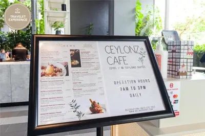 a sign for a menu in a restaurant at Ceylonz Suite KLCC, Travelet in Kuala Lumpur