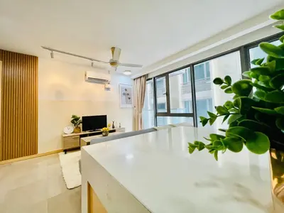 a living room with a white table and a large window at #125 Bintang Fairlane KLCC - Lot 10 - Pavilion - Fahrenheit for 1-5px in Kuala Lumpur