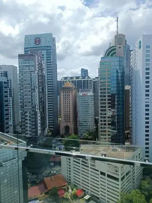 a view of a large city with tall buildings at RM2a18 Bukit Bintang Balcony Studio in Kuala Lumpur