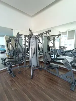 a gym with several tread machines in a room at RM201 Bukit Bintang 2 Bedroom Balcony CIty View in Kuala Lumpur