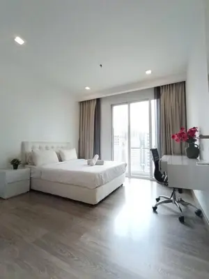 a white bedroom with a bed and a desk at RM201 Bukit Bintang 2 Bedroom Balcony CIty View in Kuala Lumpur