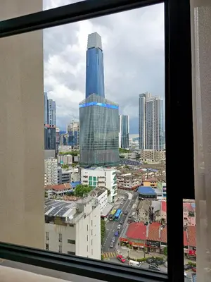 a view of a city skyline from a window at The Axon Residence - Bukit Bintang Kuala Lumpur in Kuala Lumpur
