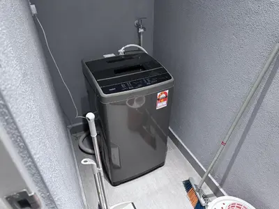 a trash can in the corner of a room at KL Trion Residence near Velocity - IKEA - Lalaport - Bukit Bintang in Kuala Lumpur