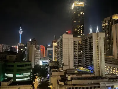 a city skyline at night with a lot of tall buildings at Axon Residence Bukit Bintang Kuala Lumpur By Apex in Kuala Lumpur