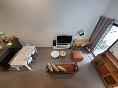 a living room with a couch and a tv at KL Sentral, Est Bangsar#11, 7Pax in Kuala Lumpur