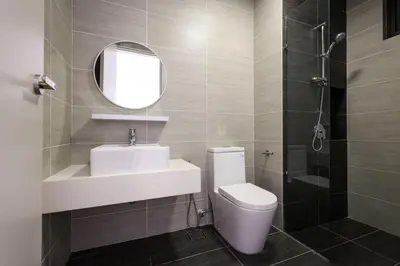 a bathroom with a sink and a toilet and a mirror at 10 min to My town family unit By Nexx Field in Kuala Lumpur