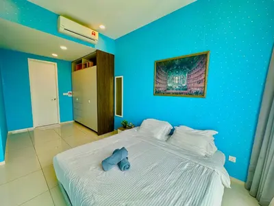 a blue bedroom with a bed with a blue elephant on it at Robertson Bukit Bintang with Netflix,TRX,KLCC in Kuala Lumpur