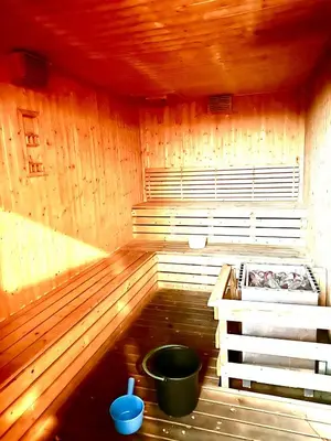 a sauna with a tub and a bucket in it at Robertson Bukit Bintang with Netflix,TRX,KLCC in Kuala Lumpur