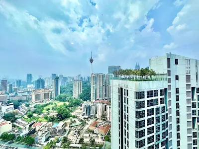 a view of a city with a tall building at Robertson Bukit Bintang with Netflix,TRX,KLCC in Kuala Lumpur