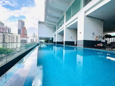 a swimming pool with a view of the city at One Bukit ceylon @ Bukit Bintang City Centre in Kuala Lumpur