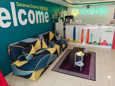 a room with couches and a table in a store at V Hotel Titiwangsa in Kuala Lumpur