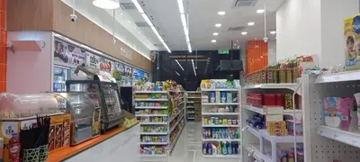 a store aisle of a grocery store with many products at COZY TWO BEDROOM APARTMENT AT MERCU SUMMER in Kuala Lumpur