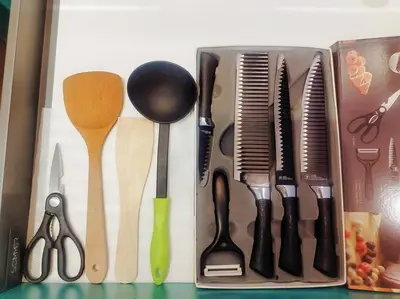 a group of kitchen utensils sitting in a box at PWTC Titiwangsa HKL near MRT family in Kuala Lumpur