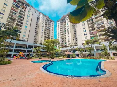 a swimming pool in front of some tall buildings at KL Panorama View City in Kuala Lumpur