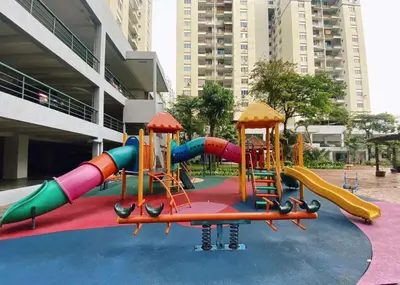 a playground with a slide in a park at KL Panorama View City in Kuala Lumpur