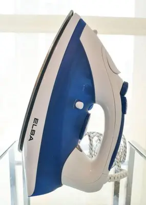 a blue and white helmet sitting on a shelf at Couple Suite at Casa Mutiara 5 mins walk to LRT, Jalan Alor and Bukit Bintang in Kuala Lumpur