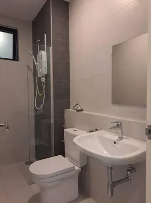a bathroom with a toilet and a sink and a phone at Lavile Premier Suite Cheras 5 - 6 pax 3R2B in Kuala Lumpur