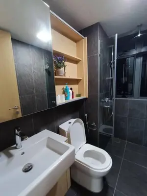 a bathroom with a toilet and a sink and a shower at CLS 16B KLCC Balcony View Studio in Kuala Lumpur