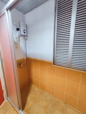 a shower stall in a bathroom with a window at Fahrenheit Pavillion Bukit Bintang By JS-Home in Kuala Lumpur