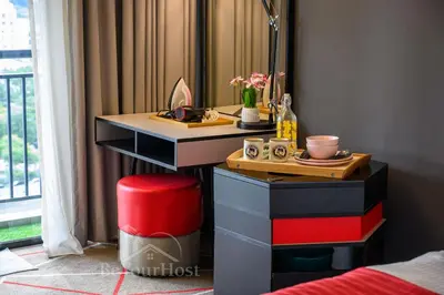 a dressing table with a sink and a mirror at Maison 101 Dang Wangi Kuala Lumpur KLCC in Kuala Lumpur