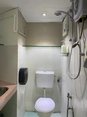 a small bathroom with a toilet and a sink at Cheras homestay @kelian in Kuala Lumpur