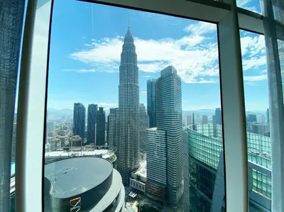 a view of a city skyline from a skyscraper at Sky Suite @ KLCC - 3BR KLCC View in Kuala Lumpur