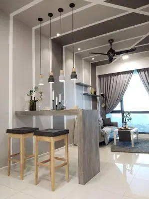 a living room with a table and some chairs at 1 Room 1 Bathroom The Robertson KLCC in Kuala Lumpur