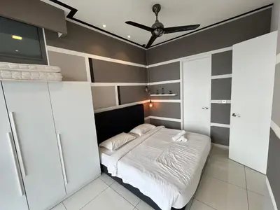 a bedroom with a bed and a ceiling fan at 1 Room 1 Bathroom The Robertson KLCC in Kuala Lumpur