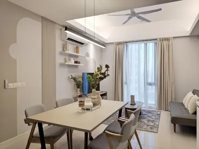 a dining room and living room with a table and chairs at Sentral Suites Kl Sentral By Luxe Home in Kuala Lumpur
