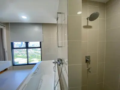 a bathroom with a shower and a sink and a tub at KL Gateway Penthouse by Cobnb - 10Pax in Kuala Lumpur