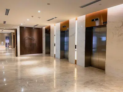 a hallway with elevators in a building at Quill Residences Suite by Mimpi B&B in Kuala Lumpur