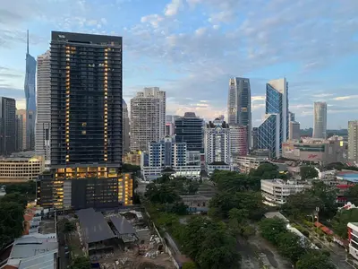 a view of a city skyline with tall buildings at Quill Residences Suite by Mimpi B&B in Kuala Lumpur