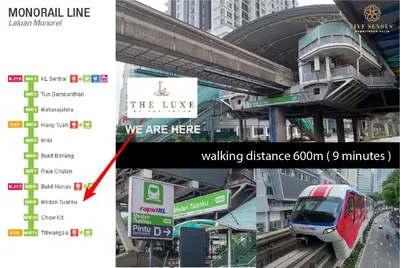 a train is on the tracks at a train station at The Luxe & The Colony, KLCC in Kuala Lumpur