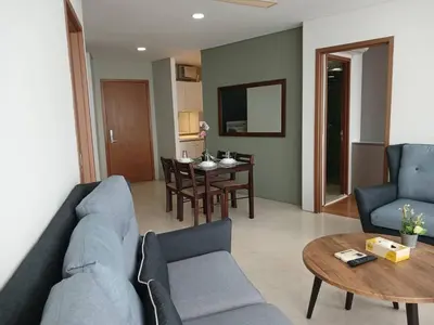 a living room with a couch and a table at VORTEX STAR KLCc APARTMENT in Kuala Lumpur