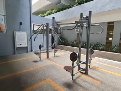 a row of gym equipment in a building at Blue Small Studio Near KLCC in Kuala Lumpur