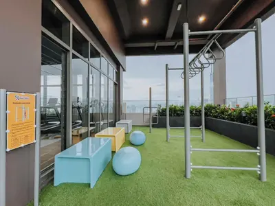 an office with a view of a room with grass at Riveria City KL Sentral by Sky Pool Minshuku in Kuala Lumpur