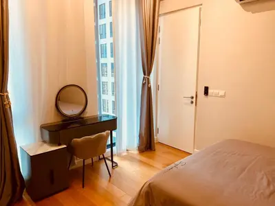 a bedroom with a desk and a mirror and a bed at Sentral Suites Kuala lumpur By Leyla 3BR suites 8 pax in Kuala Lumpur