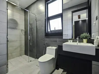 a bathroom with a toilet and a sink and a shower at Kuala Lumpur Apartment at Opus Residence Near China Town and 118 Tower in Kuala Lumpur