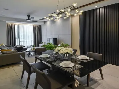 a living room with a dining room table with chairs at Kuala Lumpur Apartment at Opus Residence Near China Town and 118 Tower in Kuala Lumpur
