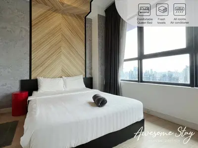 a bedroom with a large white bed with a large window at Arte plus by 2BR sweet home in Kuala Lumpur