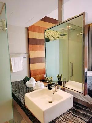 a bathroom with a sink and a large mirror at D'Majestic Place Jalan Pudu in Kuala Lumpur