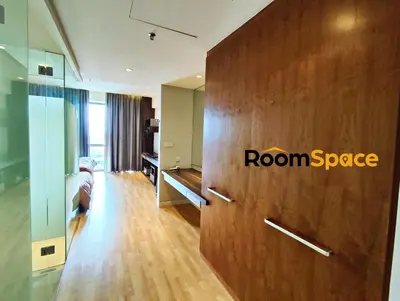 a room with a room space sign on a wooden wall at D'Majestic Place Jalan Pudu in Kuala Lumpur