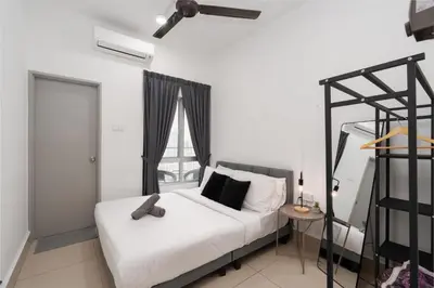 a bedroom with a bed and a bunk bed at Razak City Residence by Lisa Homestay in Kuala Lumpur