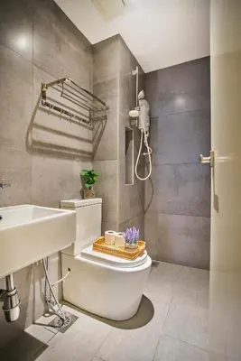 a bathroom with a toilet and a sink at Arte Mont Kiara Free Parking, Kuala Lumpur in Kuala Lumpur