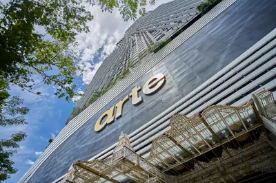 a building with a sign on the side of it at Arte Mont Kiara Free Parking, Kuala Lumpur in Kuala Lumpur