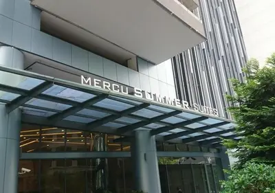 a sign for the merrill mutual studies building at Mercu Summer Suites KLCC 2BR Pastel Rose in Kuala Lumpur